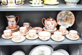 A vintage Japanese Kutani Porcelain tea service, hand coloured having traditional landscape scenes
