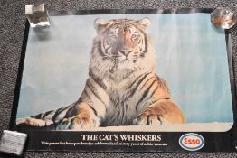 A vintage Esso advertising poster depicting tiger and reading 'The Cat's Whiskers', L68cm