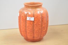 An early 20th century Pilkington's Royal Lancastrian pottery vase of ribbed swollen form with flared