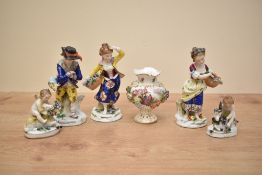 A 19th century Dresden porcelain urn, decorated with gilt edging and romantic lovers within a