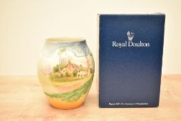 A Royal Doulton Bone China baluster vase, hand coloured with landscape scene, maker marks to base,