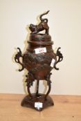 A Japanese cast and patinated metal (thought to be bronze) Koro incence burner, having stylised