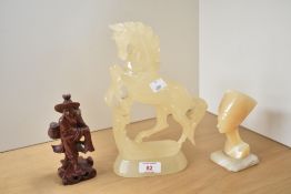 A group of three figures, comprising a Chinese fisherman of oxblood red composition with fishing