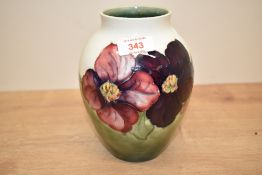 A Moorcroft Pottery Clematis pattern ovoid vase, tube-lined in the typical manner with blossoms