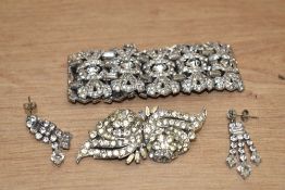 A paste set white metal Art Deco style bracelet, brooch and earring set