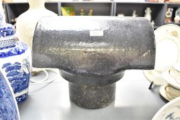 An early 20th century reclaimed Staffordshire blue half clay roof chimney cowel, w34cm x h27cm