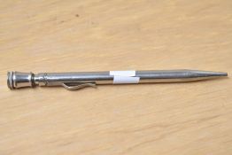 A white metal propelling pencil, marked Edac paris, 13.5cm