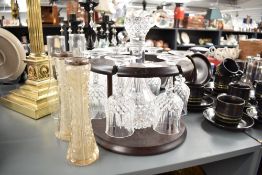 A 20th century mahogany decanter stand with a crystal cut decanter and 6 glasses, h20cm, sold