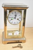 An early 20th century Phaeton by Acctim 8-day mantel clock, having Roman chapter ring and