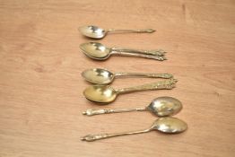 A group of nine silver plated apostle spoons, of traditional form comprising two sets of three and
