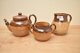 A Royal Doulton stonewareWhisky jug, decorated dated 1658 and RSM, pattern No. 3310, marked The