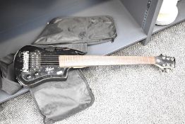 A Hofner electric guitar with picks and carry case, L81cm