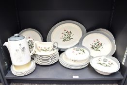 A Wedgwood Mayfield pattern part dinner service, decorated with foliage on a white ground with