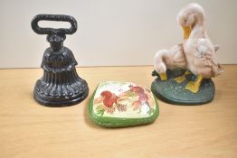 A cast iron door porter in the form of two ducks, h21cm, sold together with another door porter