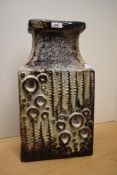 A large West German ceramic vase, decorated with geometrical patterns on a glaze ground, impressed