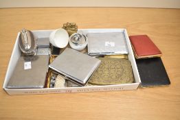 A box containing various vintage cigarette cases and lighters, to include an egg lighter, h8cm