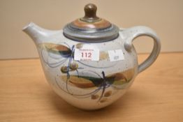 An Andrew Hague Askrigg studio pottery teapot, with spotted glaze and abstract decoration