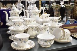 A Royal Albert Brigadoon pattern fine bone china tea service, decorated with thistles on a white