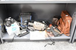 A Bauer C-500 XLM camera with instruction manual, sold together with a Minolta 110 Zoom SLR Mark 11,