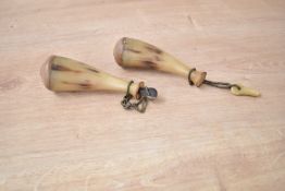 A pair of 19th century horn powder flasks, h14cm