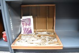 A oak canteen of Thia bronze bamboo pattern cutlery, to include forks, knives and spoons,