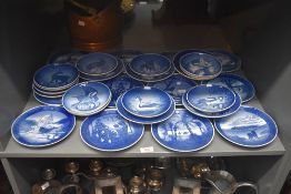 A large group of blue and white Royal Copenhagen porcelain 'Mother's Day + year' plates, decorated