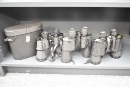 Three pairs of binoculars, comprising Europa, Optus and Greenkat in case