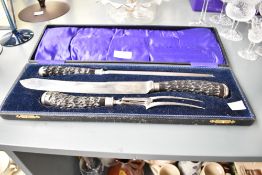A John Sanderson of Sheffield cased 3 piece carving set comprising of fork, carving knife and