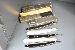 A group og early 20th century cut throut razor blades, to include an ELMO O.G & Co.Ltd, Timor blue