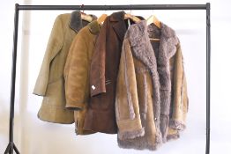 Four vintage 1950s-70s shearling coats. Two Baily's Glastonbury coats, a mid brown soft shearling