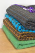 Four bolts of vintage Isle of Skye tweed, woven by award winning Portnalong weaver, Ewen MacLeod, in