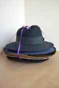 A collection of five vintage ladies hats, comprising two straw 'cowboy' styles, two wide-brimmed