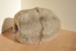 An antique real fur hand warmer or muff in a light cool grey, possible Sapphire Frost fox fur or