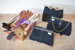 A collection of vintage ladies accessories, comprising eleven pairs of gloves, including soft kid