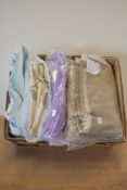 A bundle of four large fabric remnants, including: heavyweight velvet in ice blue gradient stripe,