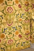 A 20th century fitted double bed coverlet in ornate foloate woven pattern, featuring deep pink,
