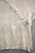 Two beautiful cream crochet bedspreads, woven with a tiled floral and foliate design, double bed