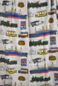 Two pairs of vintage curtains in an illustrated antique vehicle print, having red, green, blue and