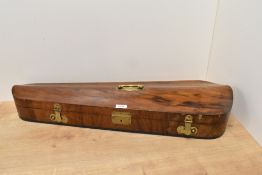 A Victorian brass mounted violin case, the hinged serpentine cover with applied brass carrying