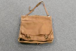 An material lined tan leather suit/garment/clothes carrier bag, with carrying handle, shoulder