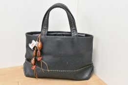 A ladies blue leather Radley handbag, of stitched construction with internal polka dot design and
