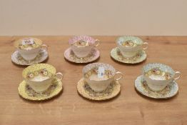 A Group of six Paragon Damask Rose pattern fine china tea cups and saucers, each decorated in