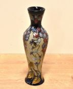 A Moorcroft Pottery 'Fit For a Queen' pattern vase, of slender baluster form, tube-lined with