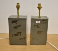 A pair of David Donaldson pottery table lamps, of rectangular form with textured and painted detail,