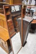 A vintage teak full length wall mirror, approx. 140 x 46cm