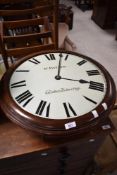 A large Victorian station/school or similar style wall clock , named to enamel dial for W Potter,