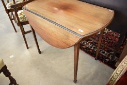 An early 20th Century Pembroke style drop leaf breakfast table with drawer to end, on square tapered