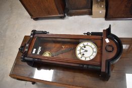 A traditional Vienna style wall clock of small proportions, height approx. 83cm