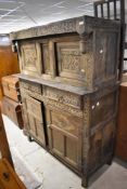 A period oak court cupboard , poor condition in need of extensive restoration