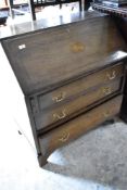 An Edwardian style oak bureau having shell inlay , width approx. 84cm